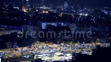 商务大厦曼谷市区夜间交通位置，高清高角度拍摄，丁登区曼谷